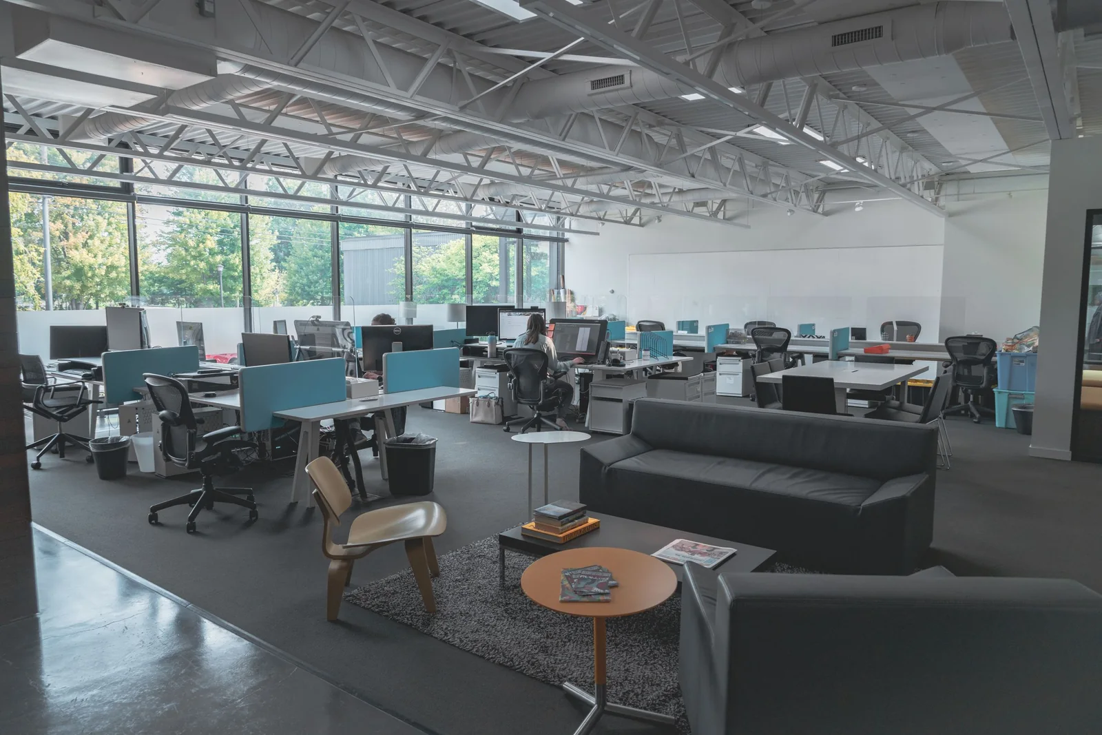 A bright open-plan office with big windows